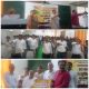 BK Manju Didi, Principal Shyam Vashisth, BK Kamlesh, and faculty members during the Drug-Free India pledge and meditation session at BLJS College Tosham.